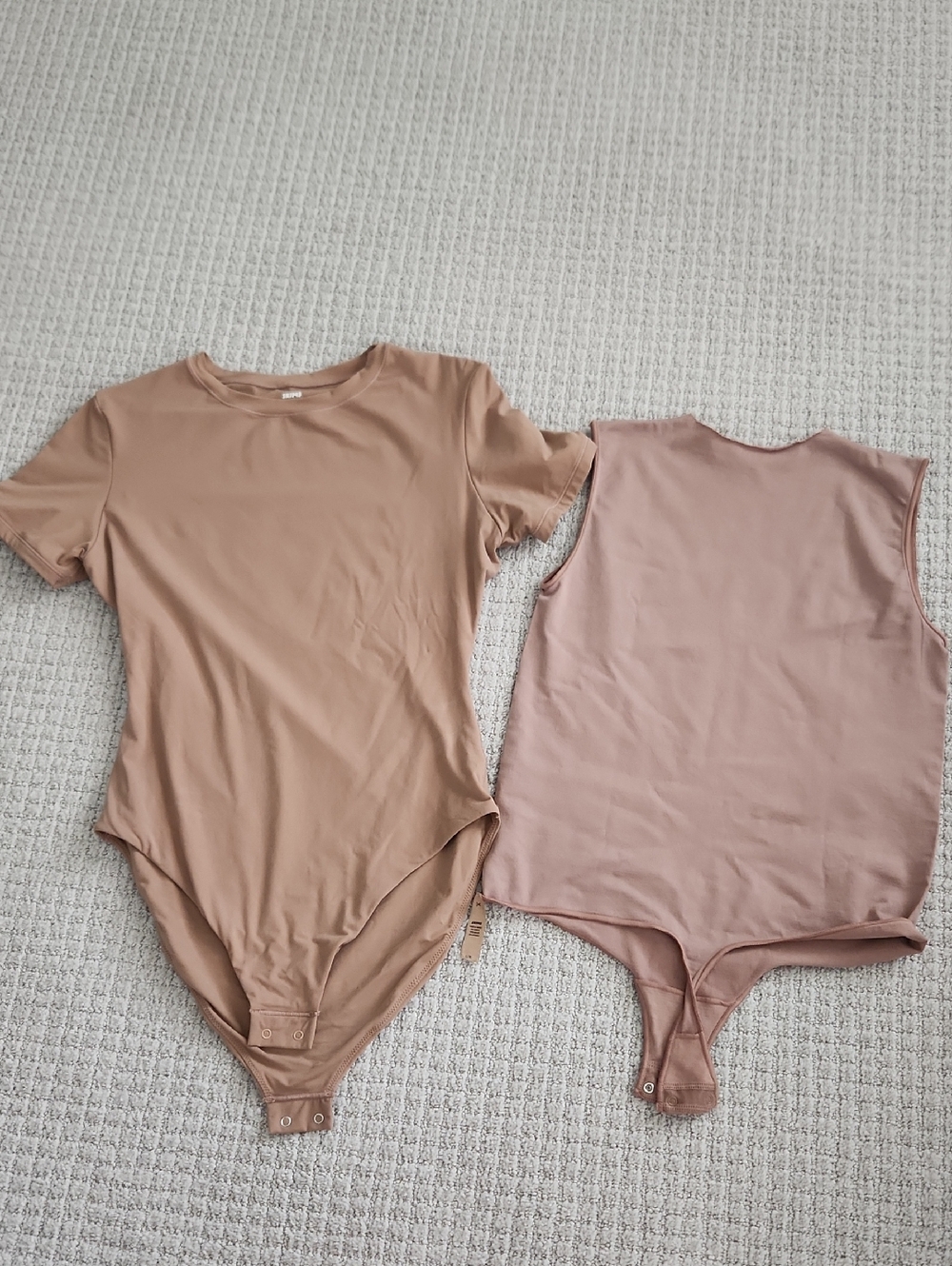 SKIMS One-Piece Bodysuits in Tan and Mauve